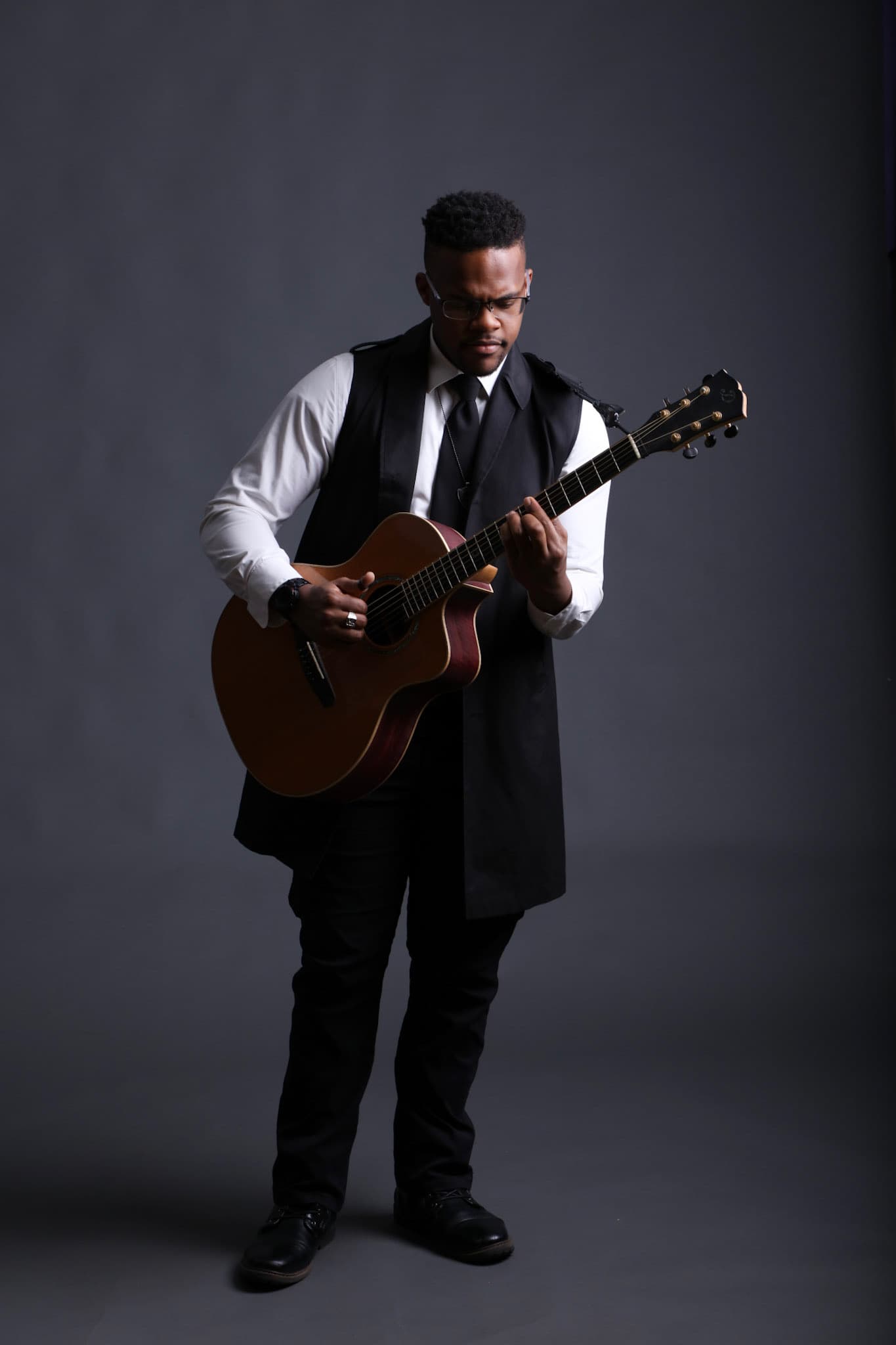 JKelly Music playing guitar