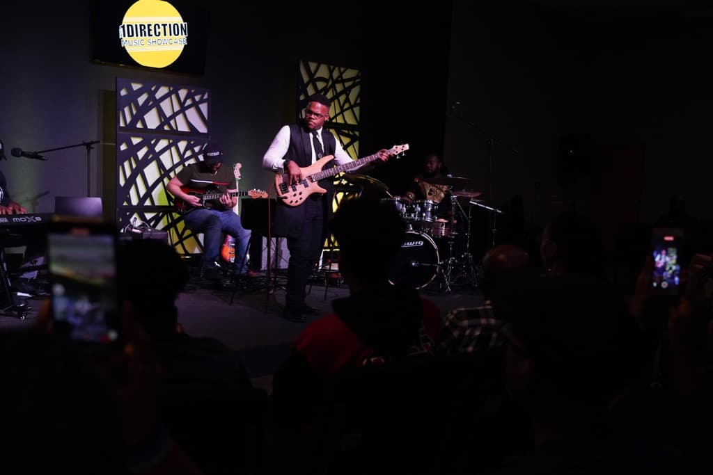 JKelly Music on stage performing at the 1Direction Music Showcase